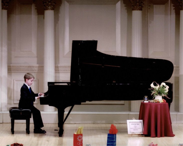 Brendan Carroll, age 8, performing Buzzing Bee at his first Carnegie Hall recital in 2014. Photo taken by Dana Benner (portraitsbydana@hotmail.com)